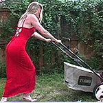 Housewife mowing lawn getting frisky