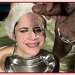 Brunette chick gets drenched in a cum bath