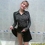 Blond teen girl disrobing and pissing in bathroom