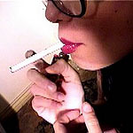 Naughty and sexy teen sucking on a cigarette
