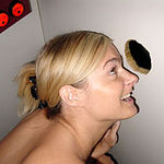 Wife blowing strangers at the bookstore booth