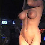 Fake titted blonde stripper dances and has guys enjoy her big tits