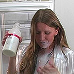 Sexy housewife gets a milk bath
