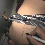 Husband makes wife suck cock at the gloryhole