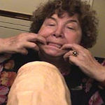 Horny shorthaired granny fucking with a big dildo