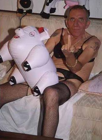 inflatable sheep and man in lady's underwear